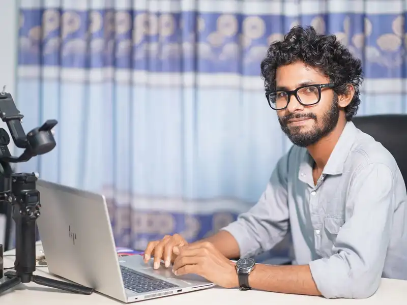A web developer at his desk