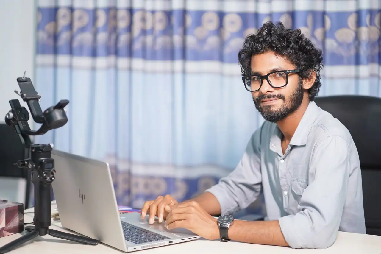 A web developer at his desk